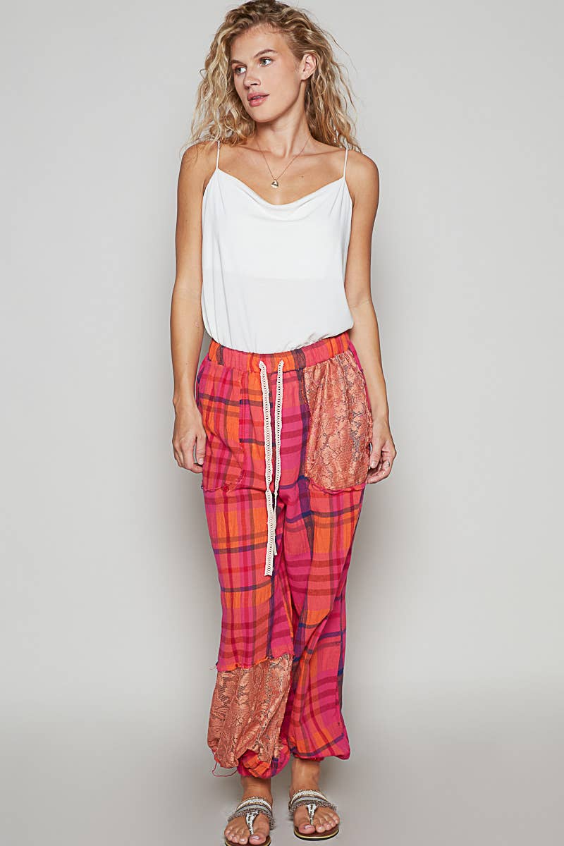 Plaid pattern raw edge woven jogger pants