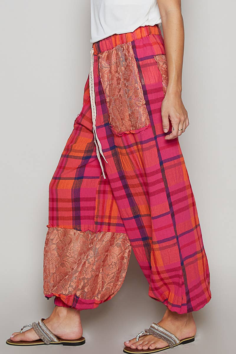 Plaid pattern raw edge woven jogger pants