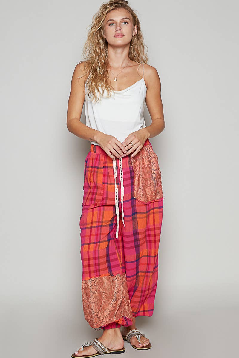 Plaid pattern raw edge woven jogger pants