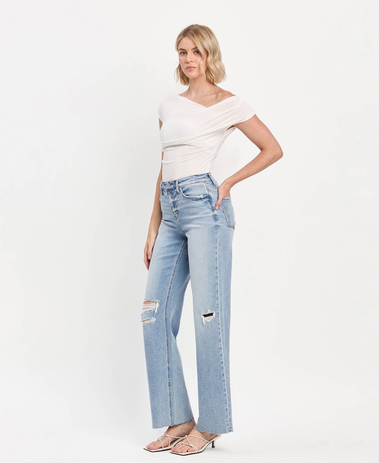 HIGH RISE CLEAN CUT RAW HEM WIDE LEG JEANS