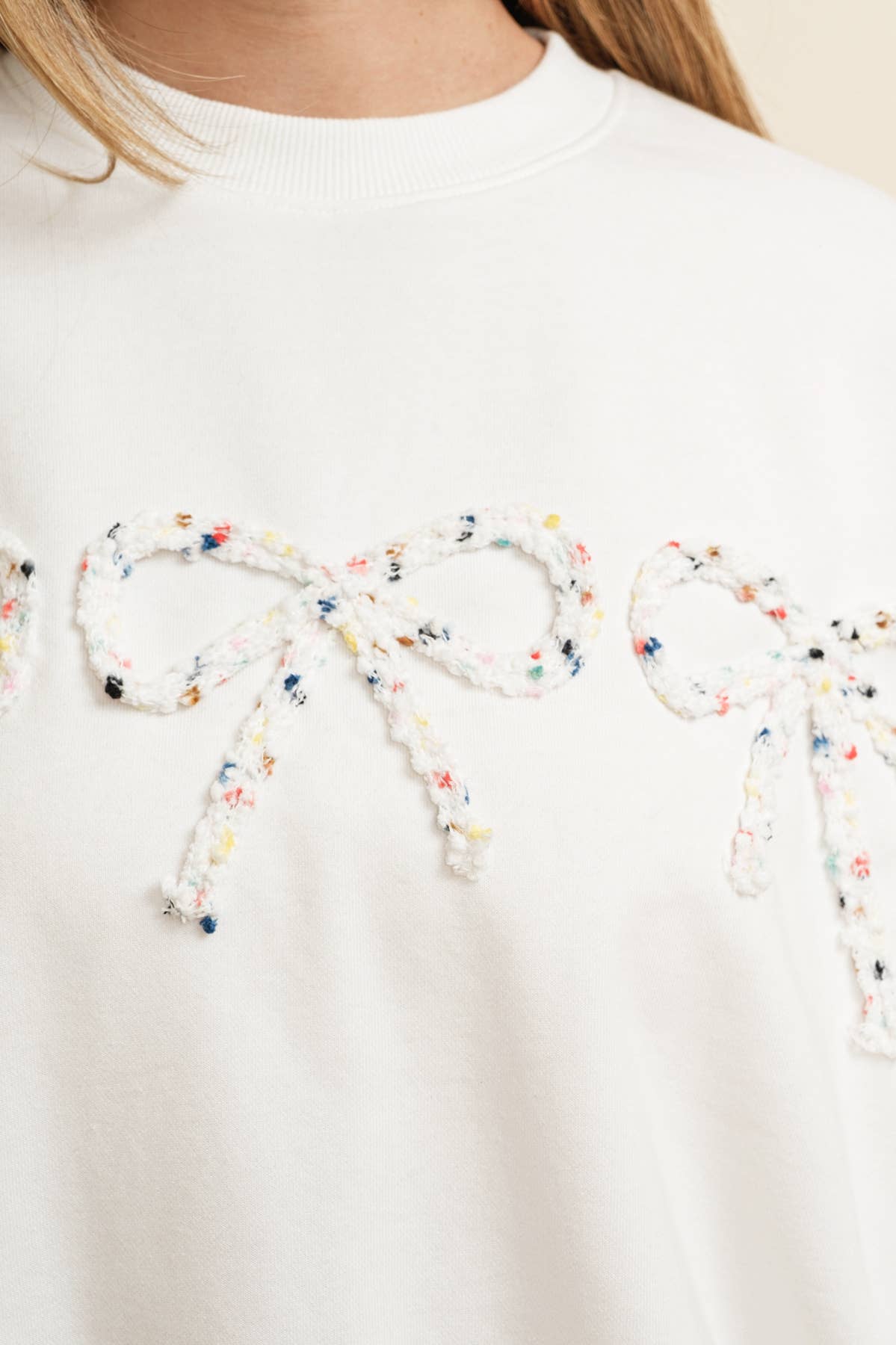 BOW ACCENT PULLOVER TOP