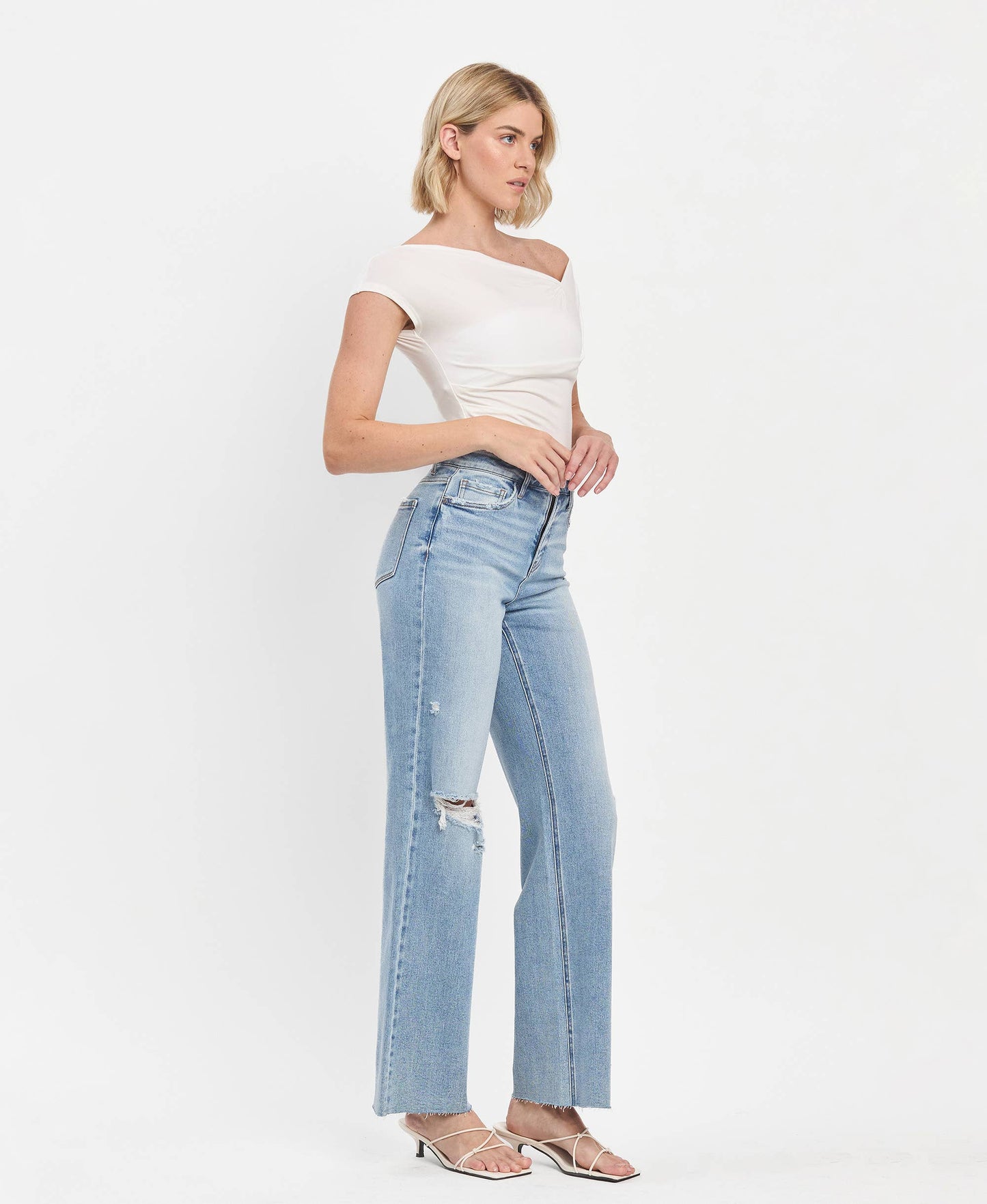 HIGH RISE CLEAN CUT RAW HEM WIDE LEG JEANS